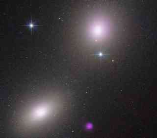 Star-eating-black-hole-spotted-by-Hubble-and-Chandra