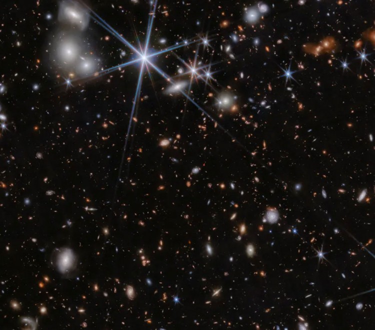 Supermassive black holes are merging in the galaxy system ZS7