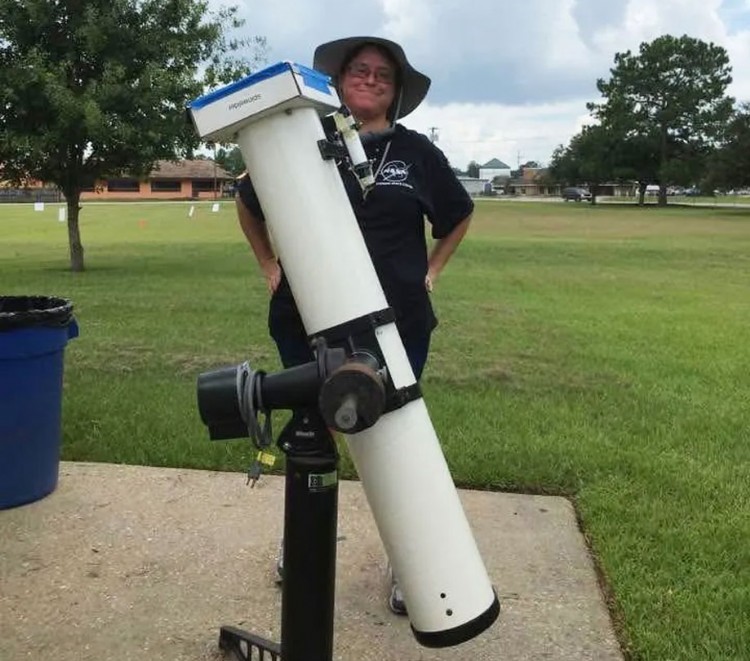 Christina Zeringue enjoys viewing the partial solar eclipse