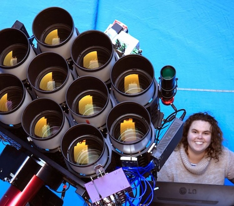 Sarah Caddy pictured with the Huntsman Telescope