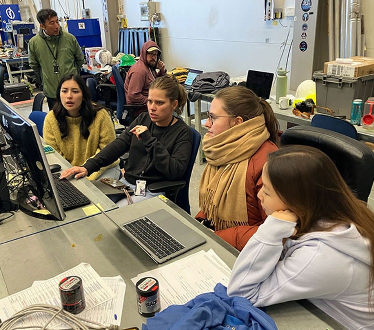 Scientists analyzing the data following the launch