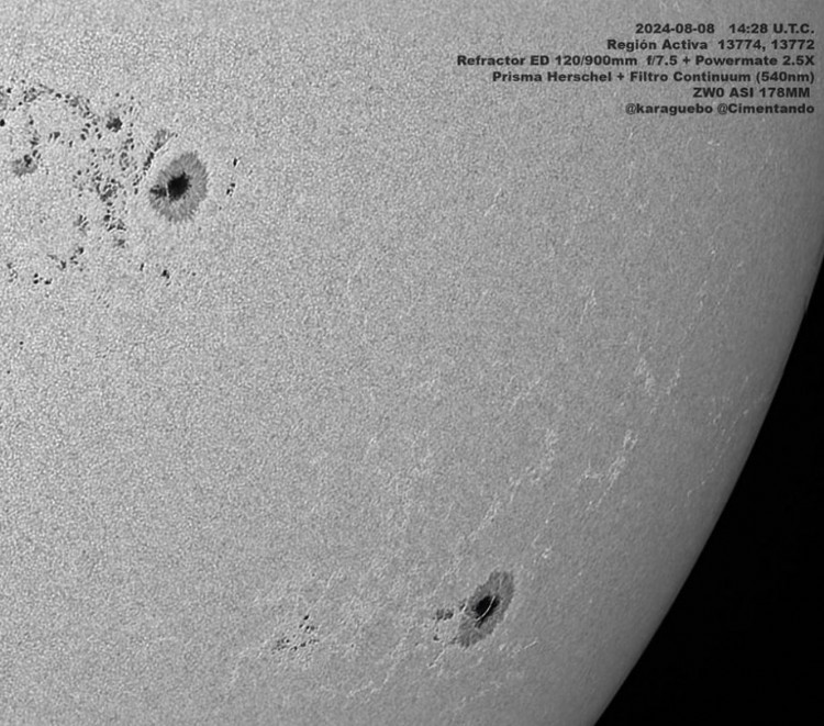 Sunspots and granules near the limb of the sun