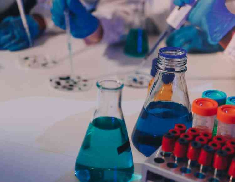 chemists in a lab making new medications