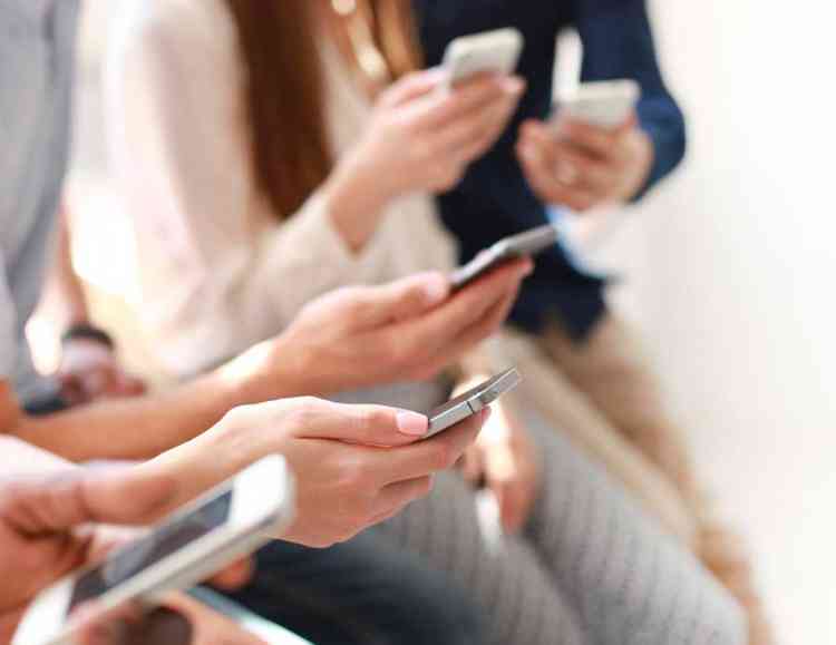 group of friends using social media apps