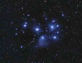 Pleiades star cluster meets Supermoon in the night sky